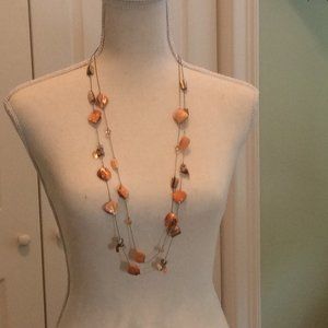 Delicate peach colored shell and bead necklace